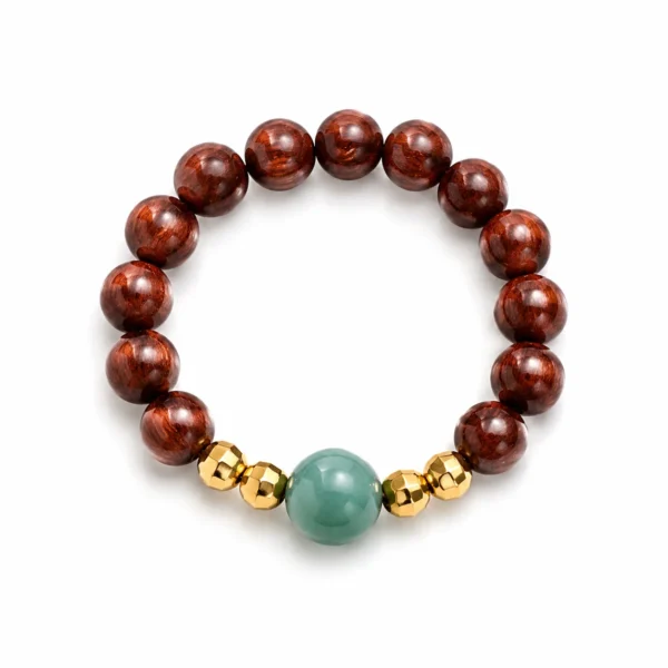 golden sandalwood jade beaded ring on white background