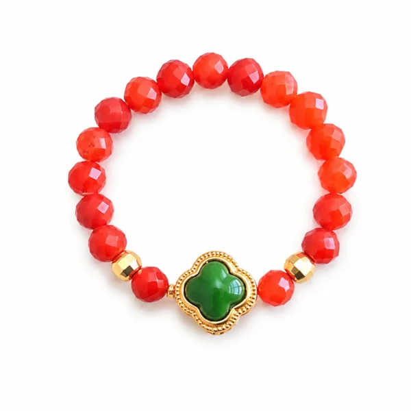 red agate flower beaded ring green clover on white background