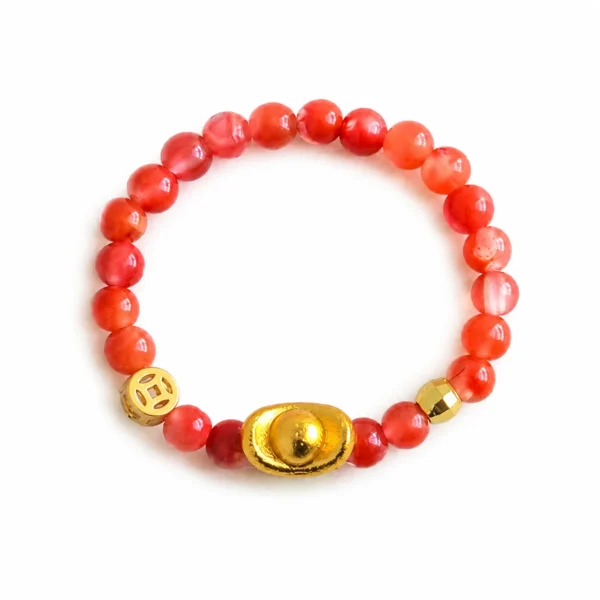 red beaded lucky ingot ring on white background