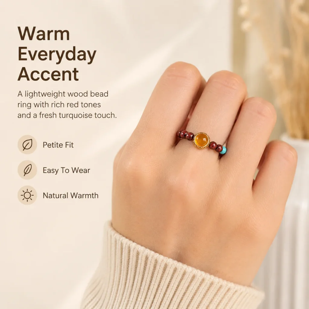 red sandalwood beaded ring amber center wearing view