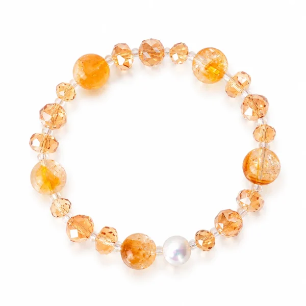 yellow citrine beaded bracelet on white background