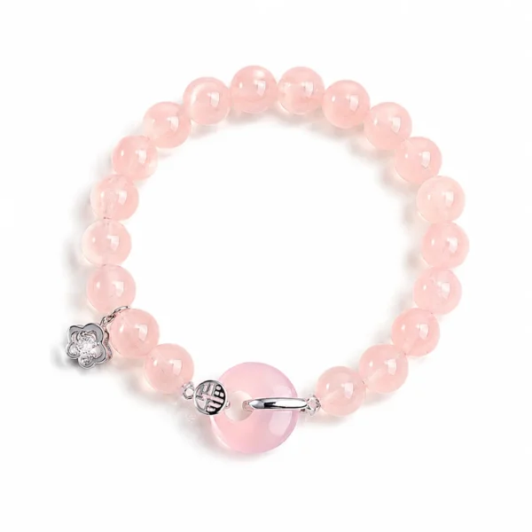rose quartz silver fu charm bracelet on white background