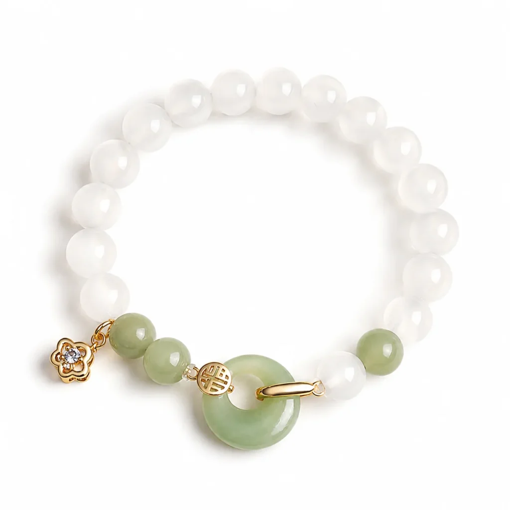 white agate hetian jade gold bracelet on white background