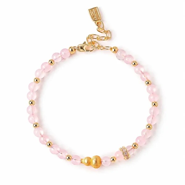 rose quartz gourd beaded bracelet on white background