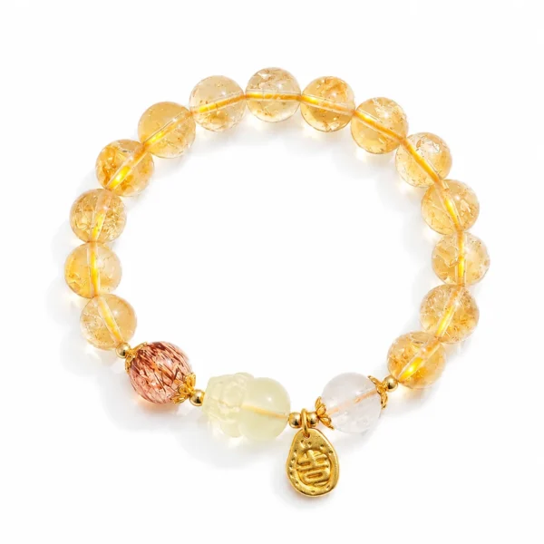 yellow phantom quartz gilded beaded bracelet on white background