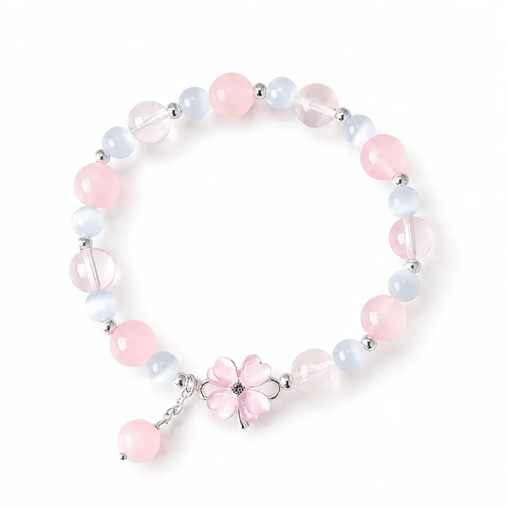 Translucent Rose Quartz Clover Bracelet 1 translucent rose quartz clover bracelet on white background