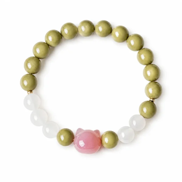 avocado alashan cat beaded bracelet on white background