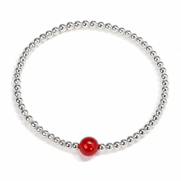 silver tone bead bracelet on white background
