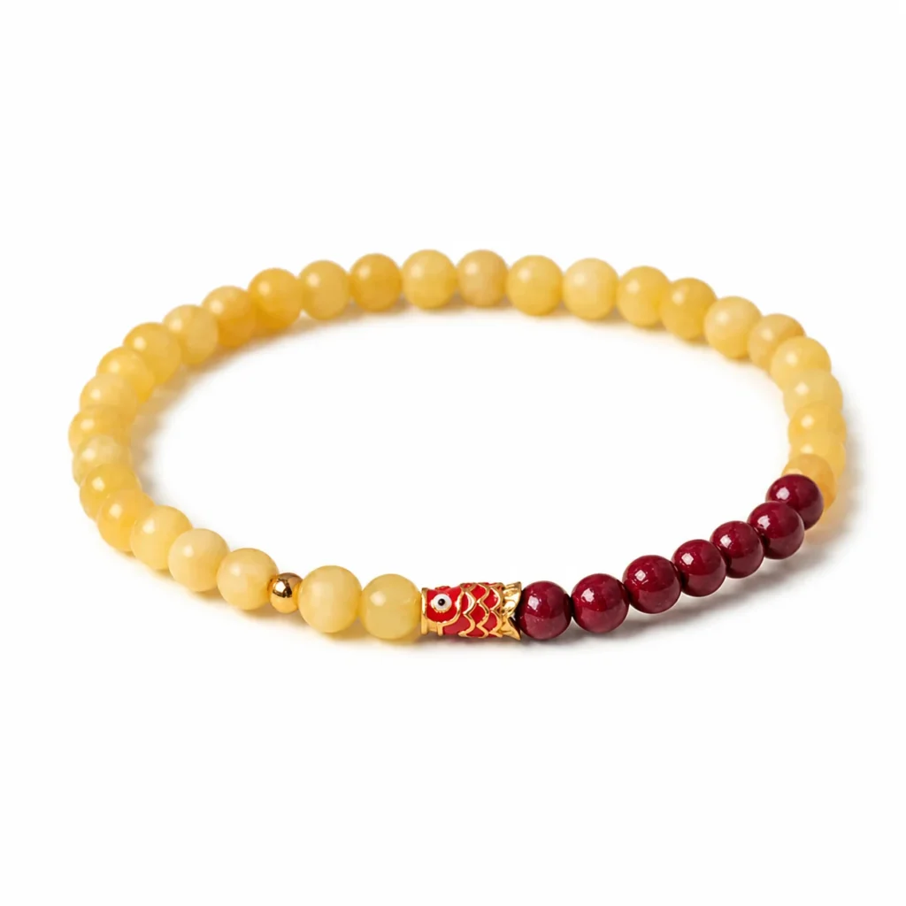 yellow jade cinnabar koi bracelet on white background