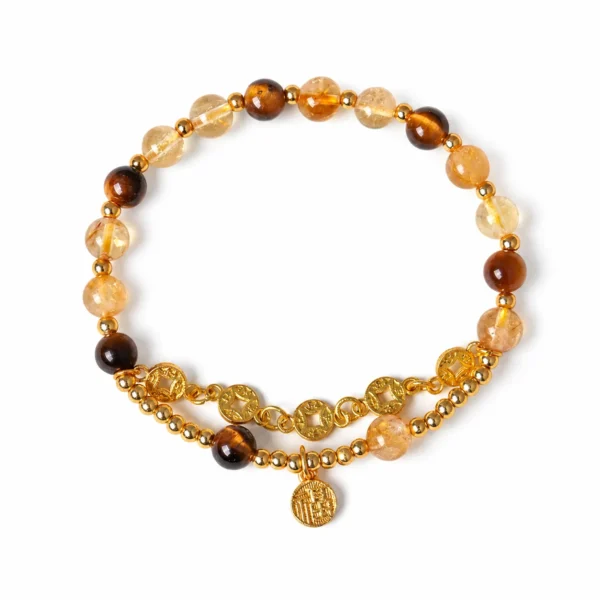 yellow tower crystal coin luck bracelet on white background