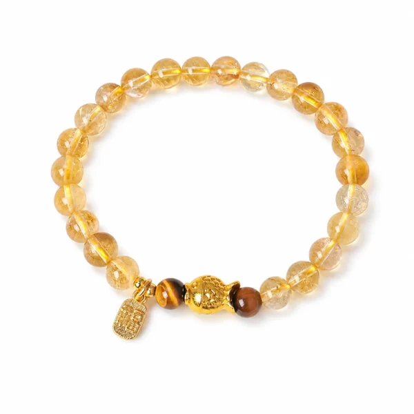 yellow tower crystal koi charm bracelet on white background