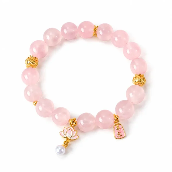 classic madagascar rose quartz beaded bracelet on white background