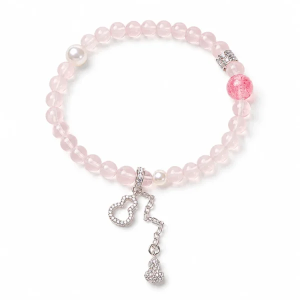 rose quartz gourd charm beaded bracelet on white background