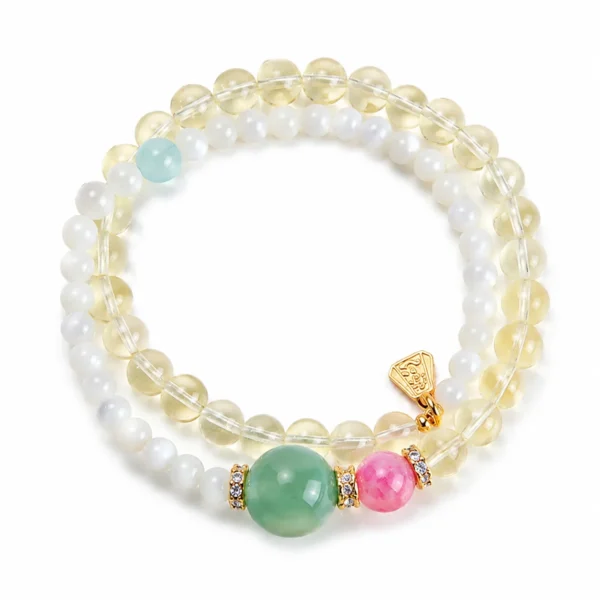lemon quartz cowrie double-wrap bracelet on white background