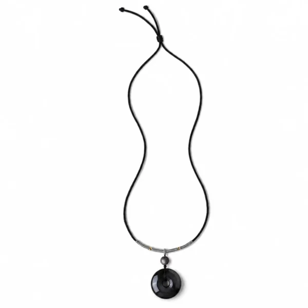 silver obsidian peace buckle necklace on white background