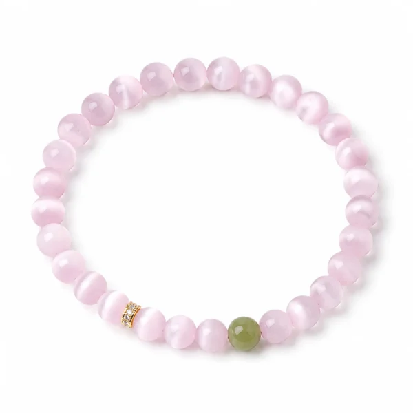 pink cat eye beaded bracelet on white background