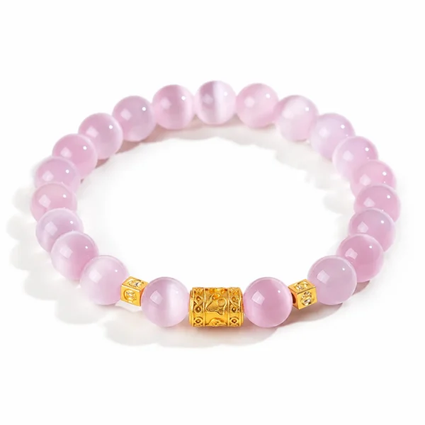 soft pink cat eye beaded bracelet on white background