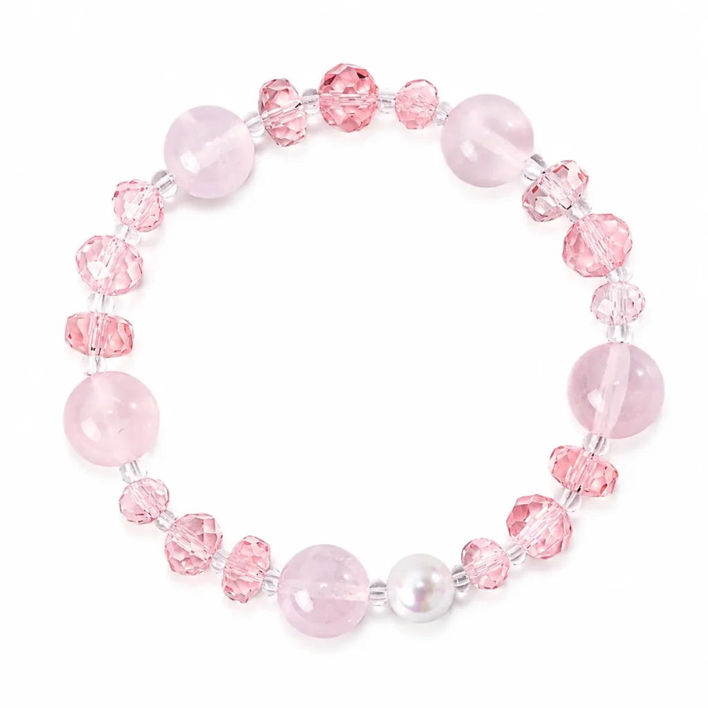 rose quartz beaded bracelet on white background