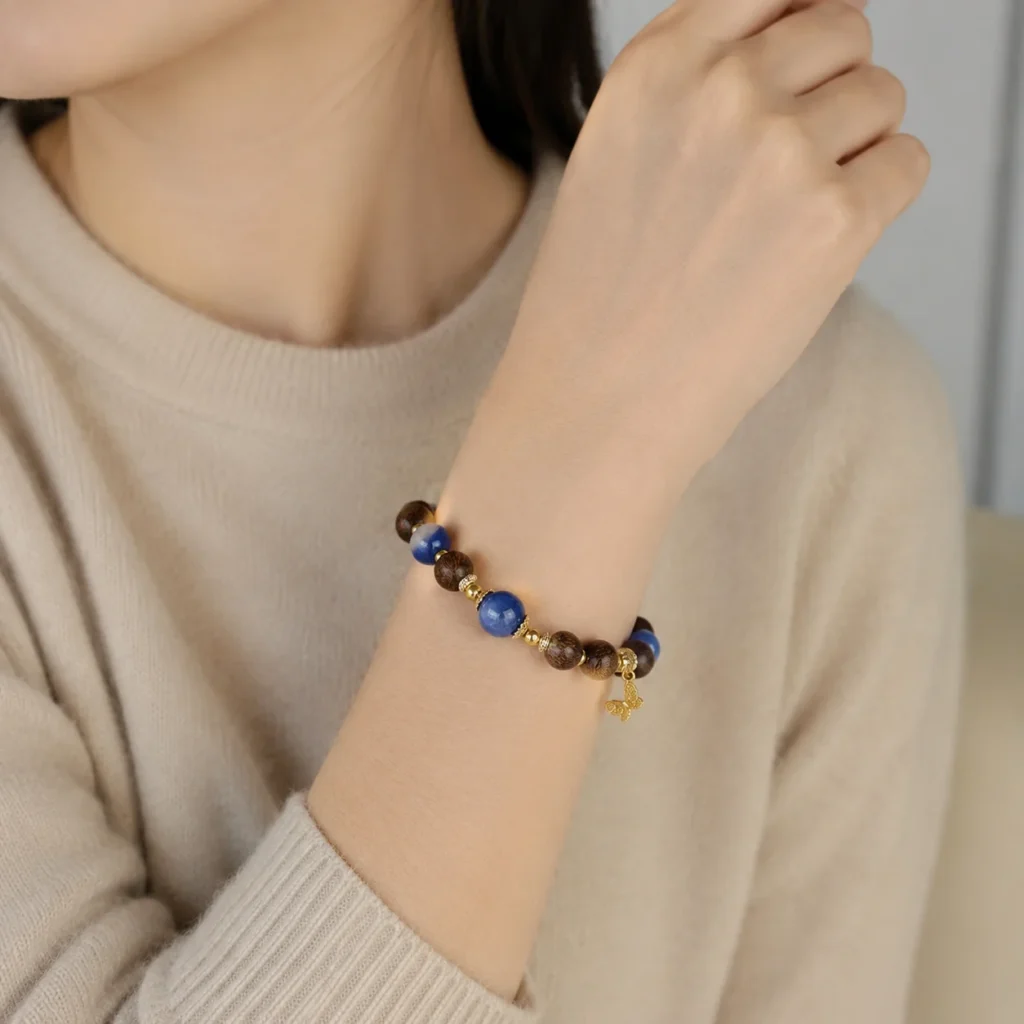 Golden Sandalwood Lapis Butterfly Bracelet with Extender Chain 2 golden sandalwood lapis butterfly bracelet with extender chain wearing view
