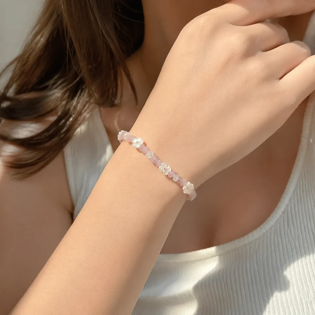 Rose Quartz Shell Flower Bracelet 2 rose quartz shell flower bracelet wearing view